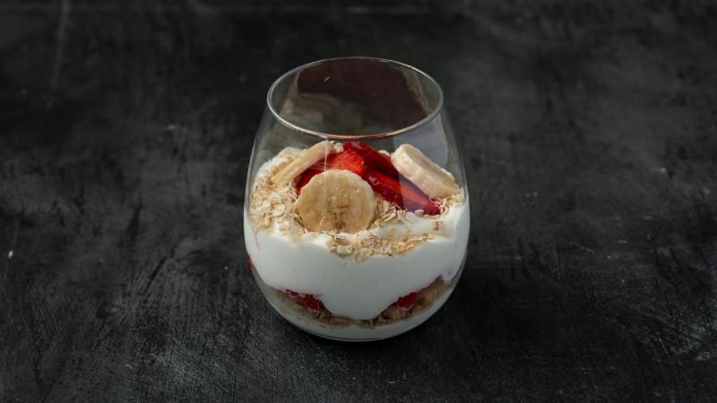 Yogurt with granola and fresh fruits 